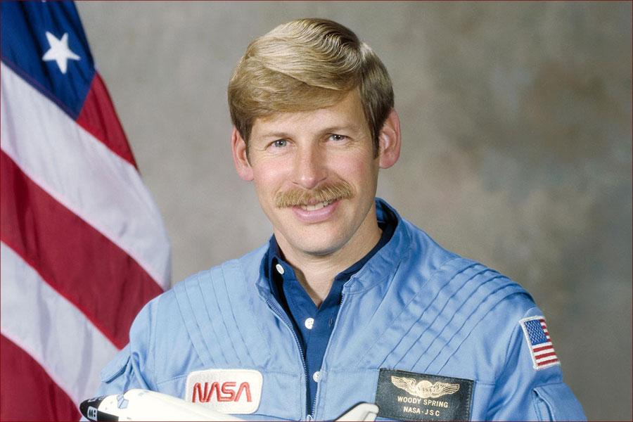 Astronauta Woody Spring